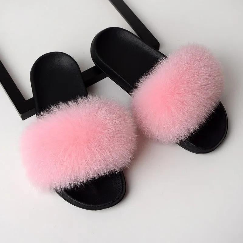 claquettes fourrure rose