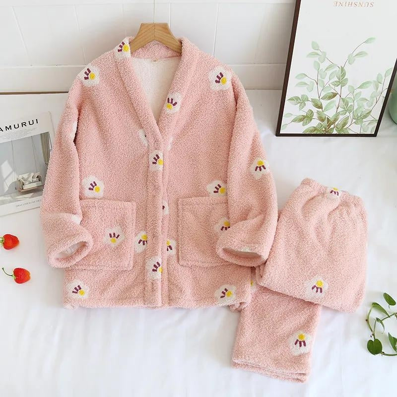 Pyjama en polaire rose clair à motifs