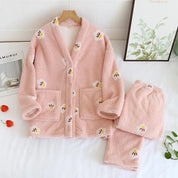 Pyjama en polaire rose clair à motifs